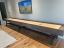 Custom leather wrapped exterior and interior walls of cradle in Distress Leather, Cradle Stain in Rich Walnut with Oil Rubbed Bronze Legs