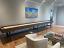 Custom leather wrapped exterior and interior walls of cradle in Distress Leather, Cradle Stain in Rich Walnut with Oil Rubbed Bronze Legs