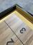Corner of Blackened Oak frame, Walnut playing surface, Tan suede, Yellow Zinc hardware