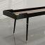Blackened Oak wood frame, Walnut playing surface, cork gutters