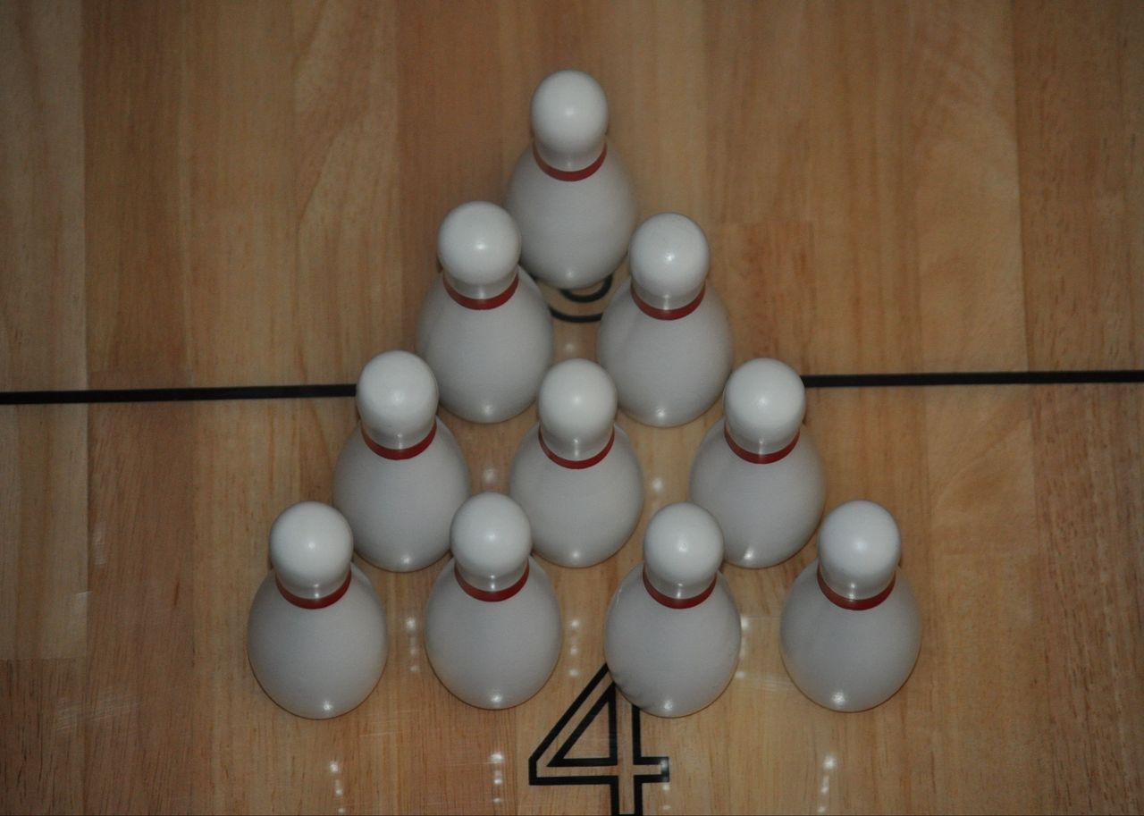 Set of 10 Solid Wood Bowling Pins with Pin Setter